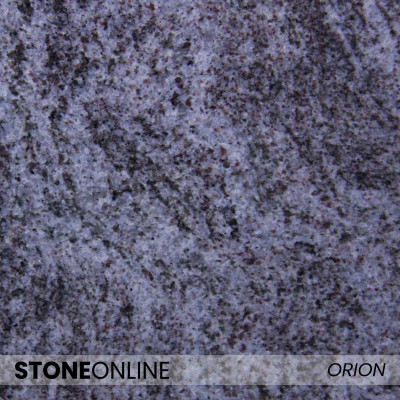 ORION (Vizag Blue) – Deep blue-violet granite with shaded streaks and striking finish.