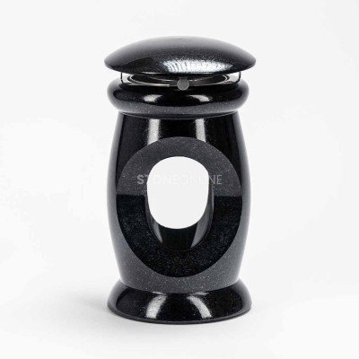Durable, refined granite lantern for a memorial.