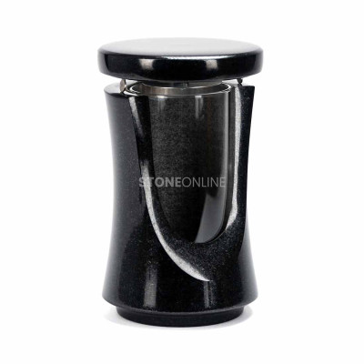 Durable, refined lantern for a memorial, made from natural granite.