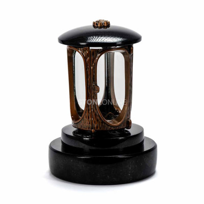 Copper lantern LALUMROSETTECOPPER with rosette on a round granite base.