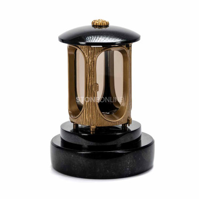LALUMROSETTEGOLD gold lantern with ornate rosette on the PROUND granite base.