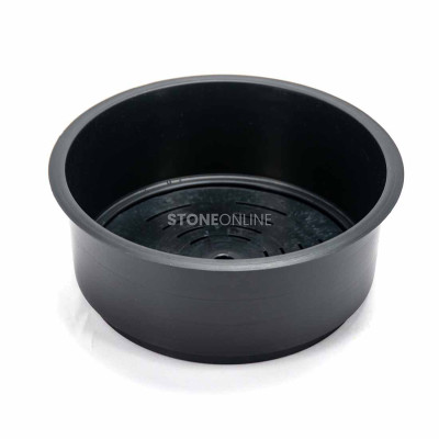 Plastic insert with grid for a granite bowl for cemetery flowers.