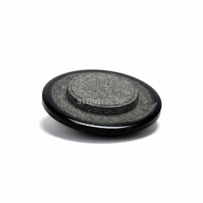 Grave vase with a lid made of durable natural granite.